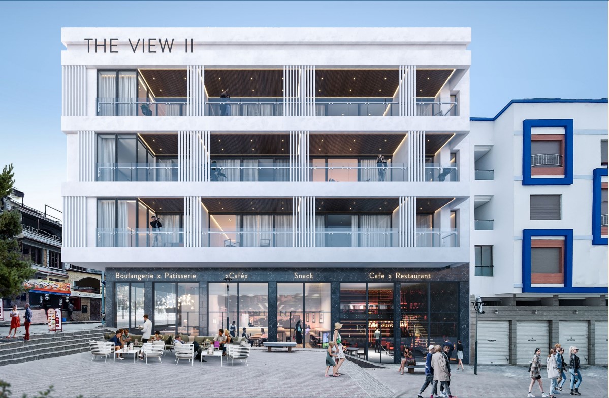 The View II — façade principale avec commerces en rez-de-chaussée